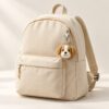 Wool Felt Pet Pendant — carried on a bag