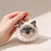 Wool Felt Pet Pendant — held in the hand