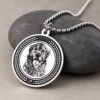 Silver Memorial Pendant — the polished disc catching light Silver Memorial Pendant — the polished disc catching light