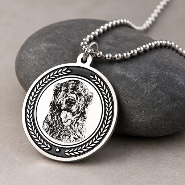 Silver Memorial Pendant — the polished disc catching light Silver Memorial Pendant — the polished disc catching light