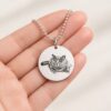 Silver Memorial Pendant — resting in an open hand Silver Memorial Pendant — resting in an open hand
