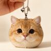 Wool Felt Pet Pendant — charm on a leather handbag