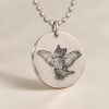 Silver Memorial Pendant — the polished rim catching the light Silver Memorial Pendant — the polished rim catching the light